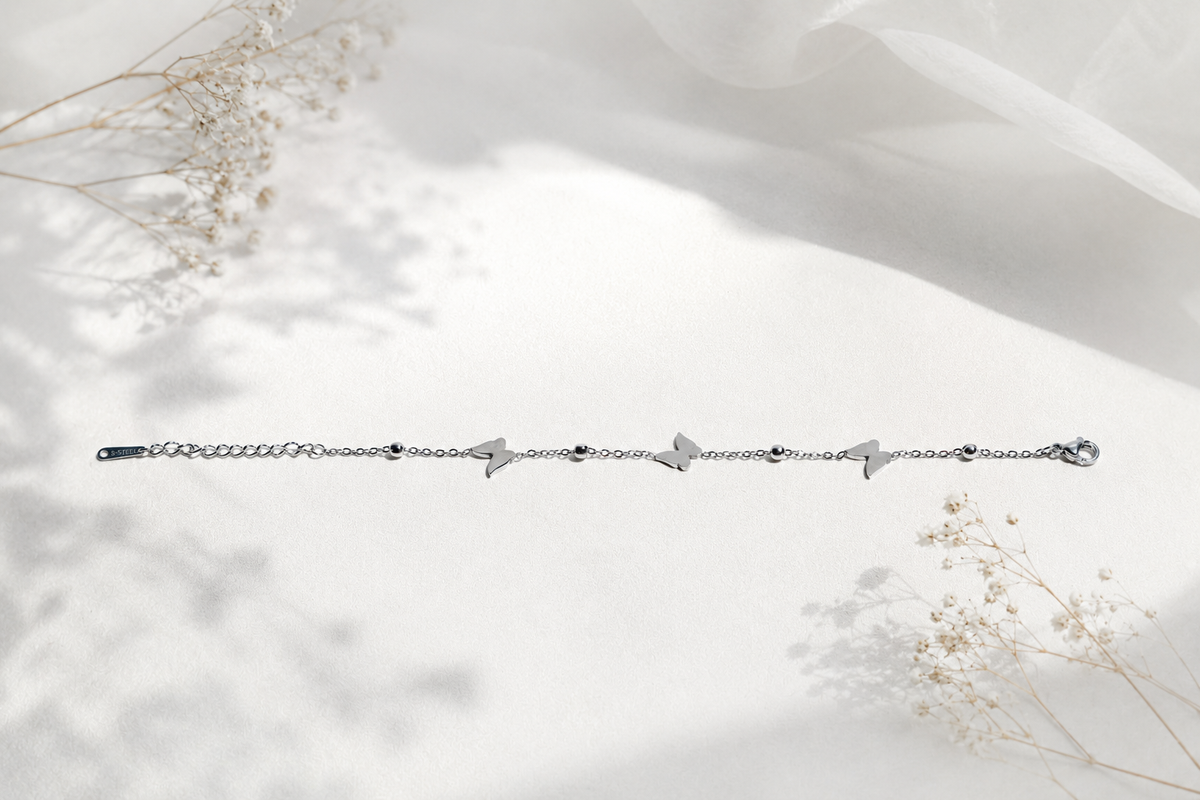 The Whispering Butterfly: 925 Sterling Silver Charm Bracelet