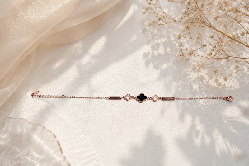 Fortune’s Bloom: Rose Gold-Plated Clover Statement Bracelet