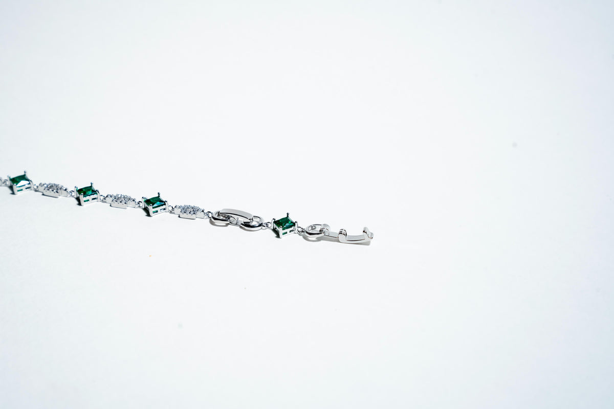 The Verdant Link: Emerald Eternity Bracelet in 925 Silver