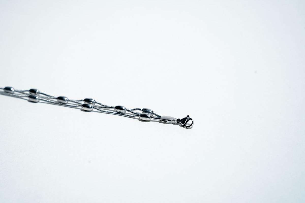 The Ethereal Strand: 925 Sterling Silver Layered Bead Bracelet