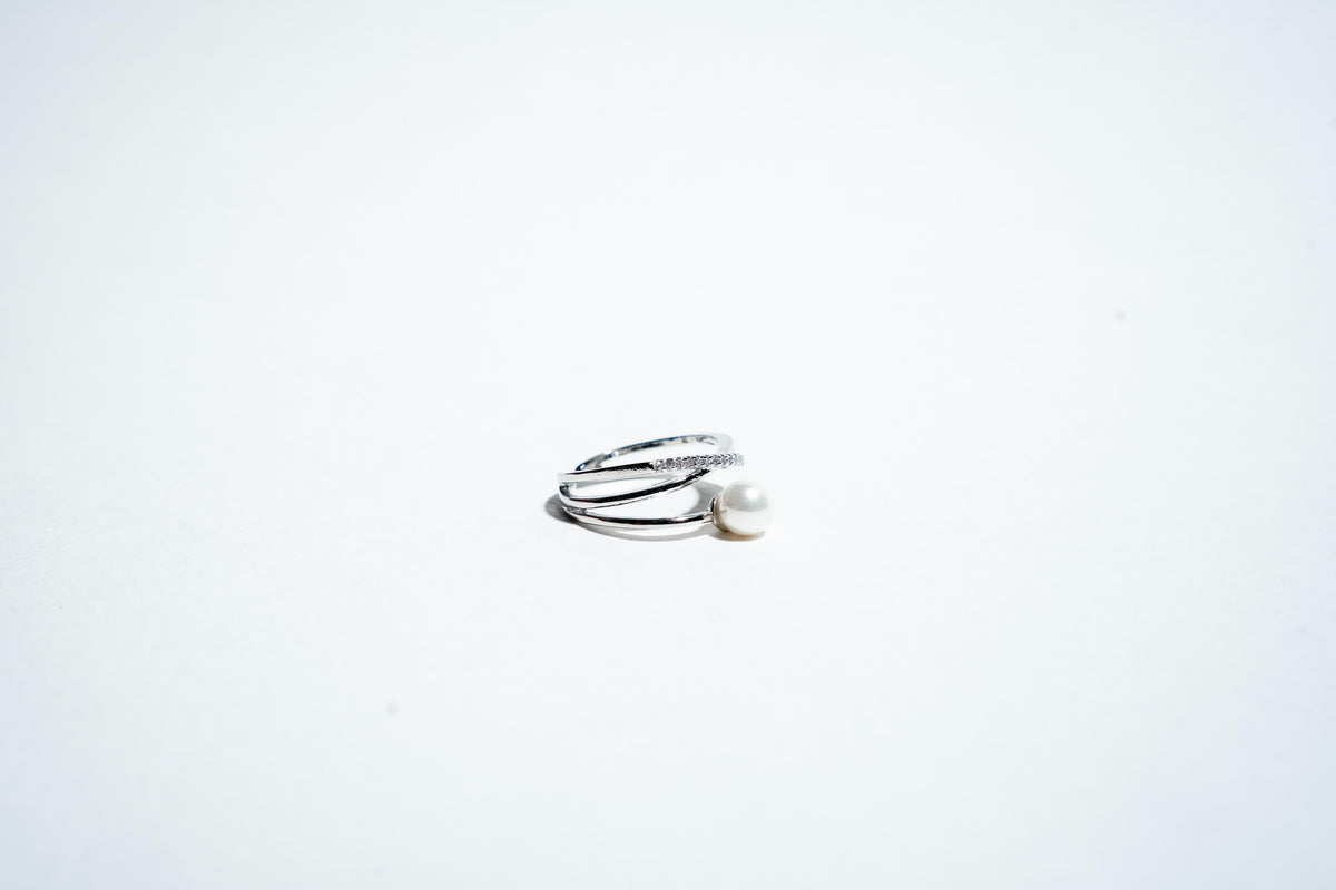 The "Ethereal Intertwine" Pearl & Pavé Crossover Ring